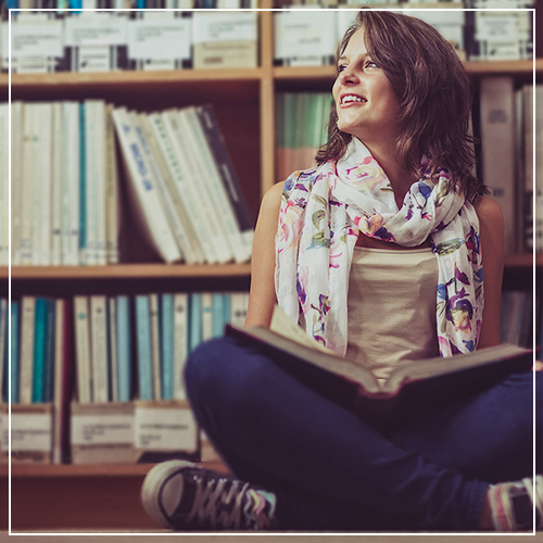 Teenage student studying in the school library